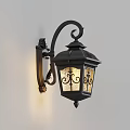 Ornate Black Vintage Wall Sconce With Illuminated Glass Shade Mounted On White Wall