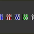 Colorful Poker Chips in Red Blue Green and Black on Dark Background
