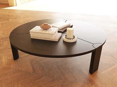 Round Black Coffee Table on Wooden Floor with Stacked Books Small Ornament and Lit Candle 3d model