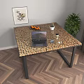 Wooden Mosaic Table Top With Black Metal Legs And Potted Plant On Herringbone Floor