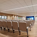 Office Conference Room Interior With Arranged White Seats Wooden Podium Wooden Walls and Ceiling Lights
