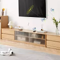 Wooden Chest of Drawers with Shelf Unit Monstera Plant Books and Decor in Minimalist Room
