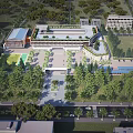 Modern School Building Featuring Multi Level Structure Large Windows Entrance Courtyard And Green Trees