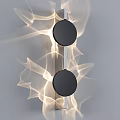 Modern Wall Lamp With Black Circular Elements And Dynamic Light Patterns For Contemporary Spaces