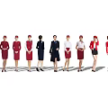 Multiple Flight Attendants In Various Stylish Stewardess Uniforms Standing Together