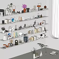 Decorative Ornament Combination On White Wall Shelves With Books Small Sculptures Plants Photo Frames