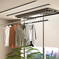 Indoor Clothes Drying Rack With Hanging Shirts And Window Blinds By City View