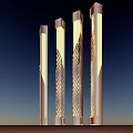 Modern Outdoor Column Lights With Textured Patterns And Illuminated Glow At Night