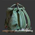 Green Canvas Backpack with Leather Accents Front Pocket and Stylish Vintage Label Design