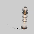Modern Floor Lamp With Sleek Metal Layered Structure And Illuminated Transparent Shade