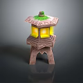 Traditional Stone Lantern With Green Grass Top And Yellow Illuminated Interior