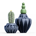 Varied Cactus Potted Plants In Blue Textured And Gold Speckled Vases For Home Decoration