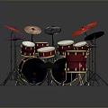 Colorful Toy Drum Set With Red Drums And Colored Cymbals On Green Mat