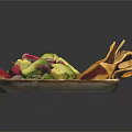 Delicious Mexican Food on Square Tray With Avocado Slices Red Onion And Crispy Tortilla Chips