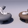 Gray and Brown Round Design Leisure Chairs With White Throw Blanket For Home Decor