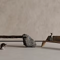 Wooden Bench Supported by Stones with Two Cats Near Light Colored Wall and Floor