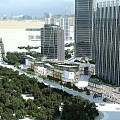 Modern Commercial Street With High Rise Buildings Green Trees And Pedestrian Walkways