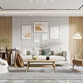 Modern Living Room Interior Featuring Beige Sofa Wooden Coffee Table Decorative Paintings And Floor Lamp