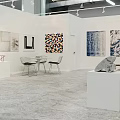 Modern Art Exhibition Space With Abstract Paintings Wooden Benches And White Walls