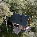 Detached Villa With Black Gabled Roof And Wood Glass Exterior In Wooded Area