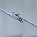 Industrial Equipment Featuring Metal Pipes Blue Motor Flange Connections And Flexible Hose