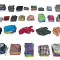 Neatly Folded Assorted Colored Clothes In Different Styles And Patterns