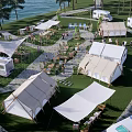 Scenic Outdoor Campsite with Tents RVs Seating Areas and Recreational Spaces
