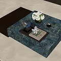 Elegant Coffee Table With Green Marble Top And Gold Frame On Beige Rug Featuring Flowers And Candles
