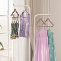 Elegant Bedroom Interior With Clothing Rack Colorful Dresses Green Plant And Decor Items