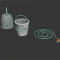 Metal Buckets And Coiled Hose With Red Nozzle On Black Surface