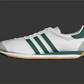White And Green Striped Sports Shoes With Light Colored Soles And Classic Design