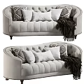 Light Beige Upholstered Sofa With Tufted Design Patterned Plain Pillows And Dark Throw Blanket 3d model
