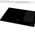 Sleek Black Glass Electric Cooktop with Circular Heating Zones Digital Display and Grill Area