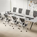 White Conference Table With Modern Office Chairs And Whiteboard In Modern Office Space