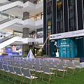 Floral Display in Shopping Mall Indoor Space With ISO Signage Greenery Tents and Fencing