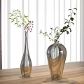 Transparent Glass Vases with Green Leaves Red Berries and White Flowers on Wooden Table