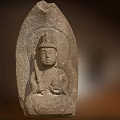 Ancient Stone Buddha Sculpture Carved With Headdress Sitting Posture And Handheld Object