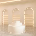 Modern White Boutique Interior With Glass Display Shelves Arched Entrance And Bright Illuminated Lighting