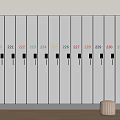 Row of White Numbered Wardrobes With Colorful Numbers Black Handles and Wooden Stool