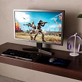 Gaming Computer Setup Featuring Monitor Keyboard Mouse Headphones On Wooden Desk With Green Plant