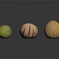 Three Exotic Fruits With Green Purple Striped And Tan Skin Displaying Unique Patterns