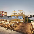 Vibrant Commercial Street With Colorful Buildings Neon Signs And Outdoor Dining Areas