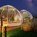 Garden Landscape with Transparent Dome Tents Starry Sky Lighting Wooden Deck and Grass at Night