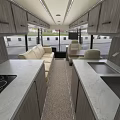 Black Motorhome With Solar Panels On Roof Blue Accents And Beige Seats Interior