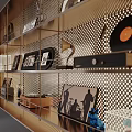 Decorative Ornaments Collection on Grid Design Display Shelves with Vintage Vinyl Records Trophies and Lighting