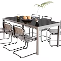 Black Glass Top Dining Table Set with Metal Frame Six Gray Chairs Oranges Green Plant