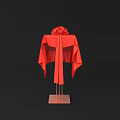 Red Tablecloths With Flower Arrangements On Metal Stands Against Black Background