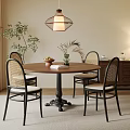 Cozy Dining Interior With Round Table Four Chairs Hanging Lamp Potted Plant And Cabinet