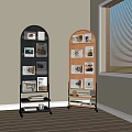 Black And Wooden Arched Bookcases With Photo Frames Books And Decorative Items Near Window