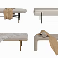 Modern Upholstered Ottoman With Neutral Fabric Metal Wooden Legs And Decorative Blanket